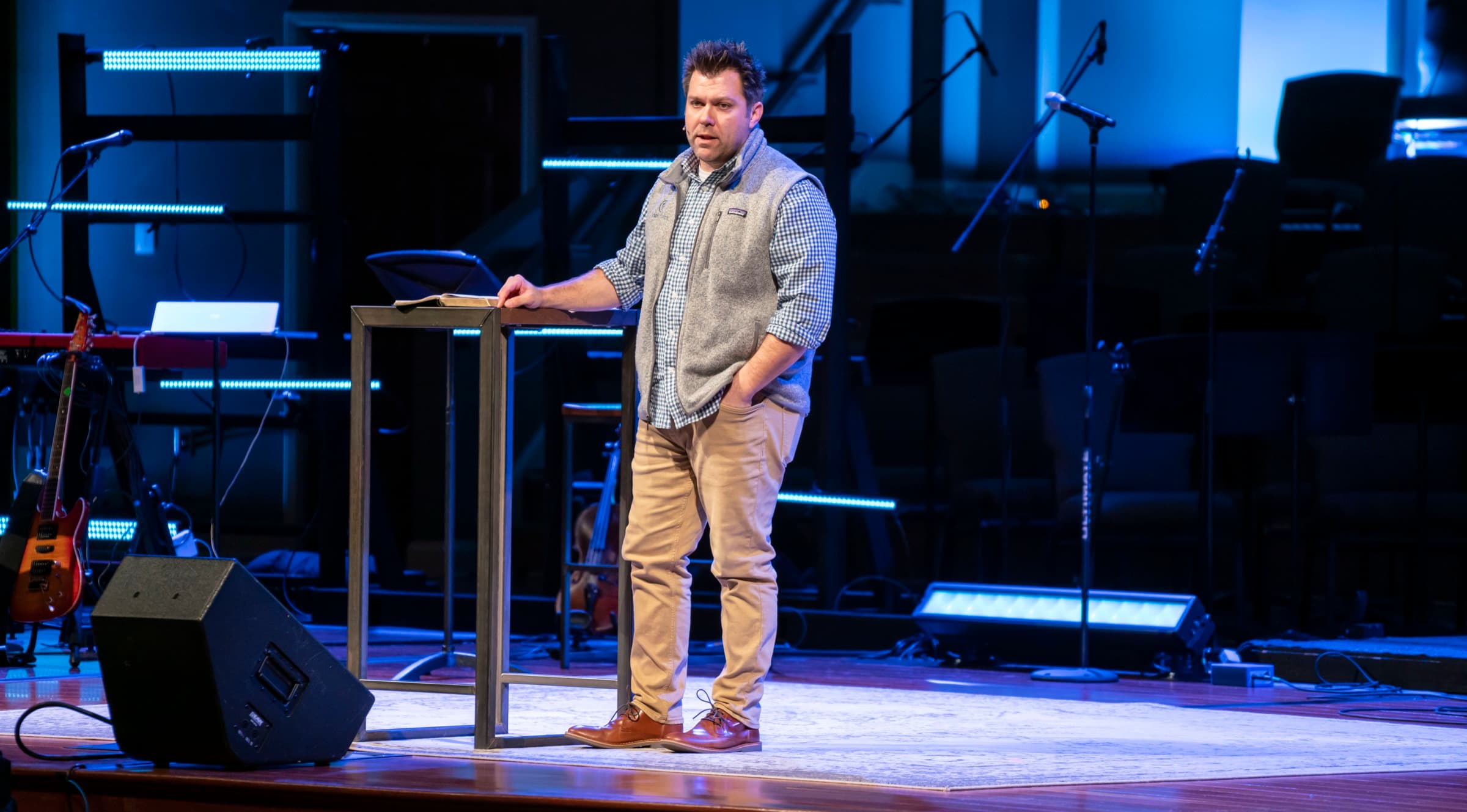 Dustin Dozier speaking on stage