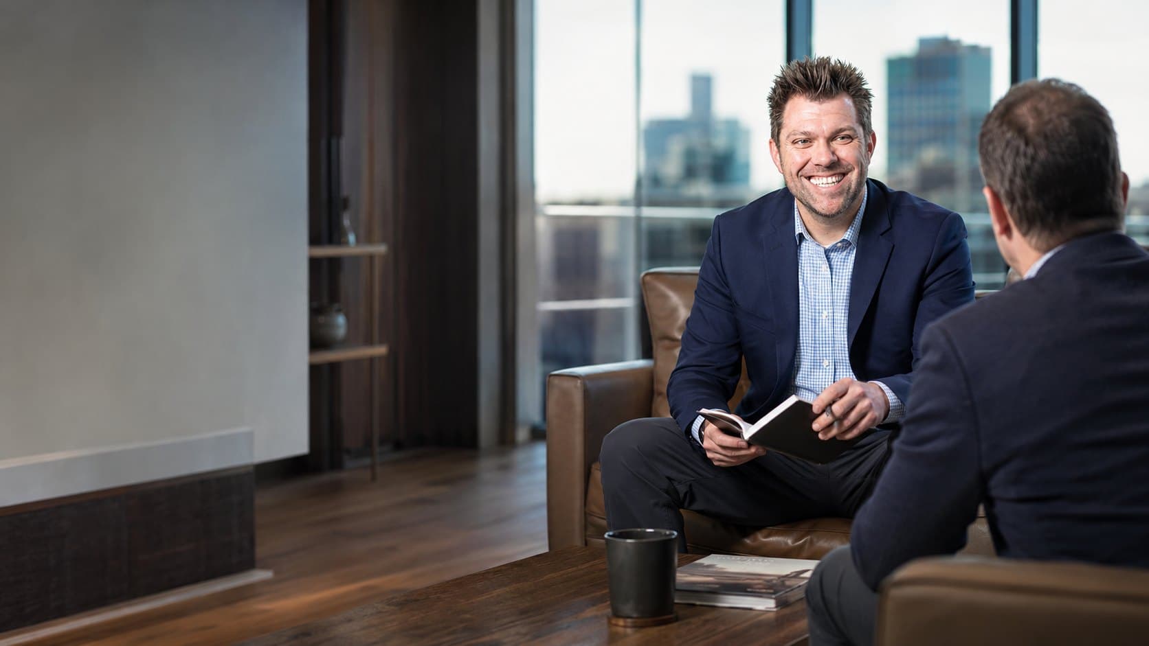 Dustin Dozier in a one-to-one coaching session with a business owner