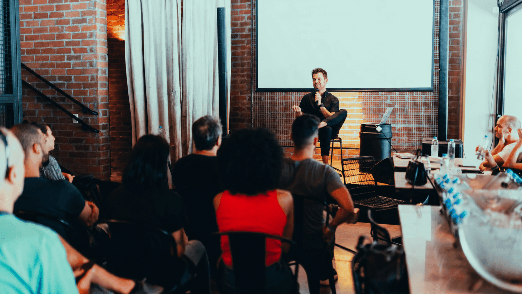 Dustin Dozier speaking to a business audience